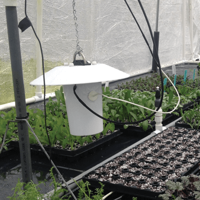 Apogee TS-100 aspirated radiation shield in a greenhouse.